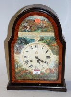Lot 10 - A reproduction walnut cased mantel clock, the...