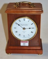 Lot 22 - A modern walnut cased mantel clock, having...