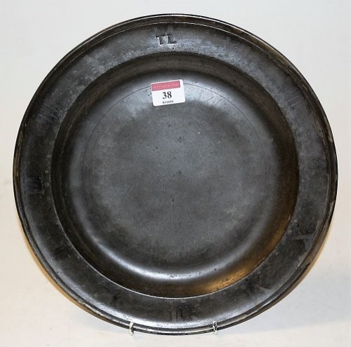 Lot 38 - An 18th century pewter plate, impressed TL to...