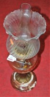 Lot 186 - A Victorian oil lamp having swirled clear...
