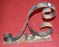 Lot 195 - An early 20th century wrought iron wall bracket
