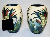 Lot 254 - A pair of contemporary Moorcroft pottery vases,...