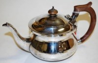 Lot 288 - A George V silver bachelors teapot, having...