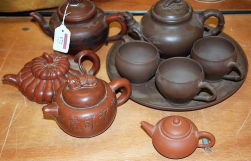 Lot 172 - A Chinese Yixing pottery teapot and cover, of...