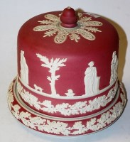 Lot 60 - A red jasperware style cheese dish and cover,...