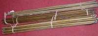 Lot 101 - A large collection of brass stair rods