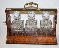Lot 105 - An Edwardian oak and silver plated...