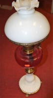 Lot 184 - A late Victorian oil lamp having opalescent...