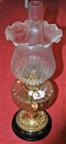 Lot 185 - A Victorian brass oil lamp having clear...