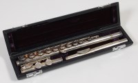 Lot 503 - A cased silver-plated three piece flute, by...
