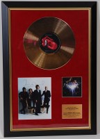 Lot 569 - A framed CD gold disc for The Rolling Stones -...