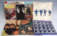 Lot 599 - Seven LP vinyl records by The Beatles, to...