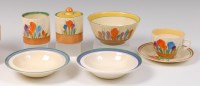 Lot 39 - A collection of Clarice Cliff pottery effects,...