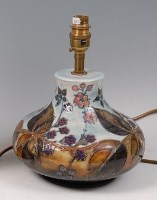 Lot 25 - A Moorcroft Pottery table lamp, in the Bramble...