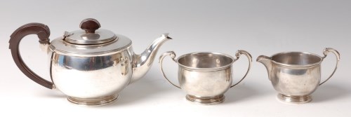 Lot 109 - An Art Deco silver three-piece tea set,...