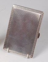 Lot 125 - A late Art Deco silver pocket cigarette case,...