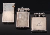 Lot 137 - A 1930s silver pocket lighter by Dunhill,...