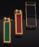 Lot 144 - A 1960s Dunhill gilt metal and black lacquered...