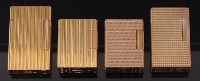 Lot 149 - Four 1960s/70s Dupont gold plated pocket...
