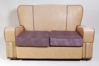 Lot 321 - An Art Deco cream vinyl upholstered two-piece...