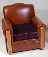 Lot 322 - An Art Deco style tan leather upholstered club...