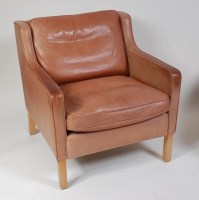 Lot 344 - A 1960s Stouby tan leather armchair, in the...