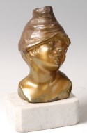 Lot 189 - A Continental Art Deco bronzed metal bust of a...