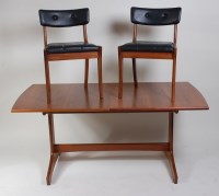 Lot 359 - A 1960s Danish teak dining suite by Vanson,...