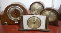 Lot 14 - An Art Deco walnut cased mantel clock, having...