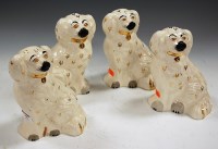 Lot 40 - A pair of Beswick models of seated Spaniels,...