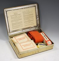 Lot 83 - A mid-20th century painted tin First Aid kit...