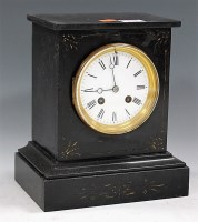 Lot 123 - An Edwardian black slate mantel clock, having...