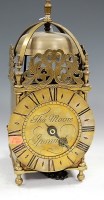 Lot 126 - A brass cased lantern clock, in the 17th...