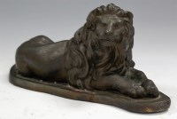Lot 169 - A bronze model of a recumbent lion, length 24cm