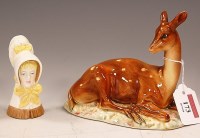 Lot 173 - A Royal Worcester young girl candle-snuffer, h....