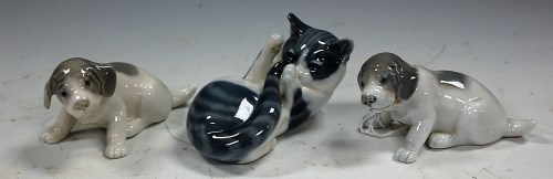Lot 200 - Two Royal Copenhagen figures of puppies,...