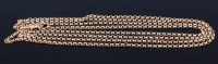 Lot 1274 - A 9ct gold belcher link long guard chain,...