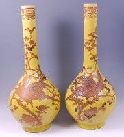 Lot 1384 - A pair of 19th century Japanese earthenware...