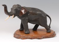 Lot 1392 - A Japanese Meiji period bronze elephant,...