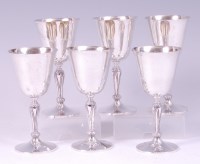 Lot 1211 - A set of six modern silver pedestal wine...