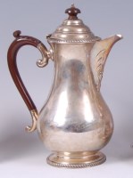 Lot 1215 - A Georgian style silver teapot and cover, of...