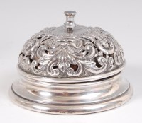 Lot 1221 - An Edwardian silver table bell, of pierced...