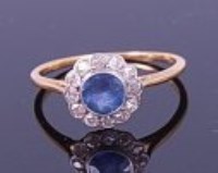 Lot 1240 - An 18ct gold, sapphire and diamond dress ring,...
