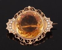 Lot 1259 - A 9ct gold, citrine and seed pearl set brooch,...