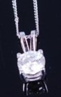 Lot 1264 - A contemporary 18ct white gold diamond pendant,...