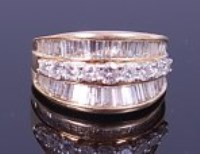 Lot 1278 - A modern 14ct gold half-hoop dress ring,...