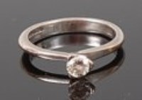 Lot 1292 - An 18ct white gold diamond solitaire ring, the...