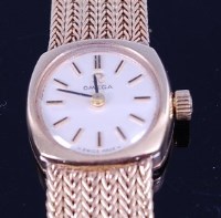 Lot 1298 - A ladies 9ct gold Omega bracelet watch, having...