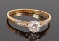 Lot 1310 - An 18ct gold and platinum diamond solitaire...