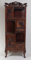 Lot 1416 - A Japanese late Meiji period 'rosewood'...